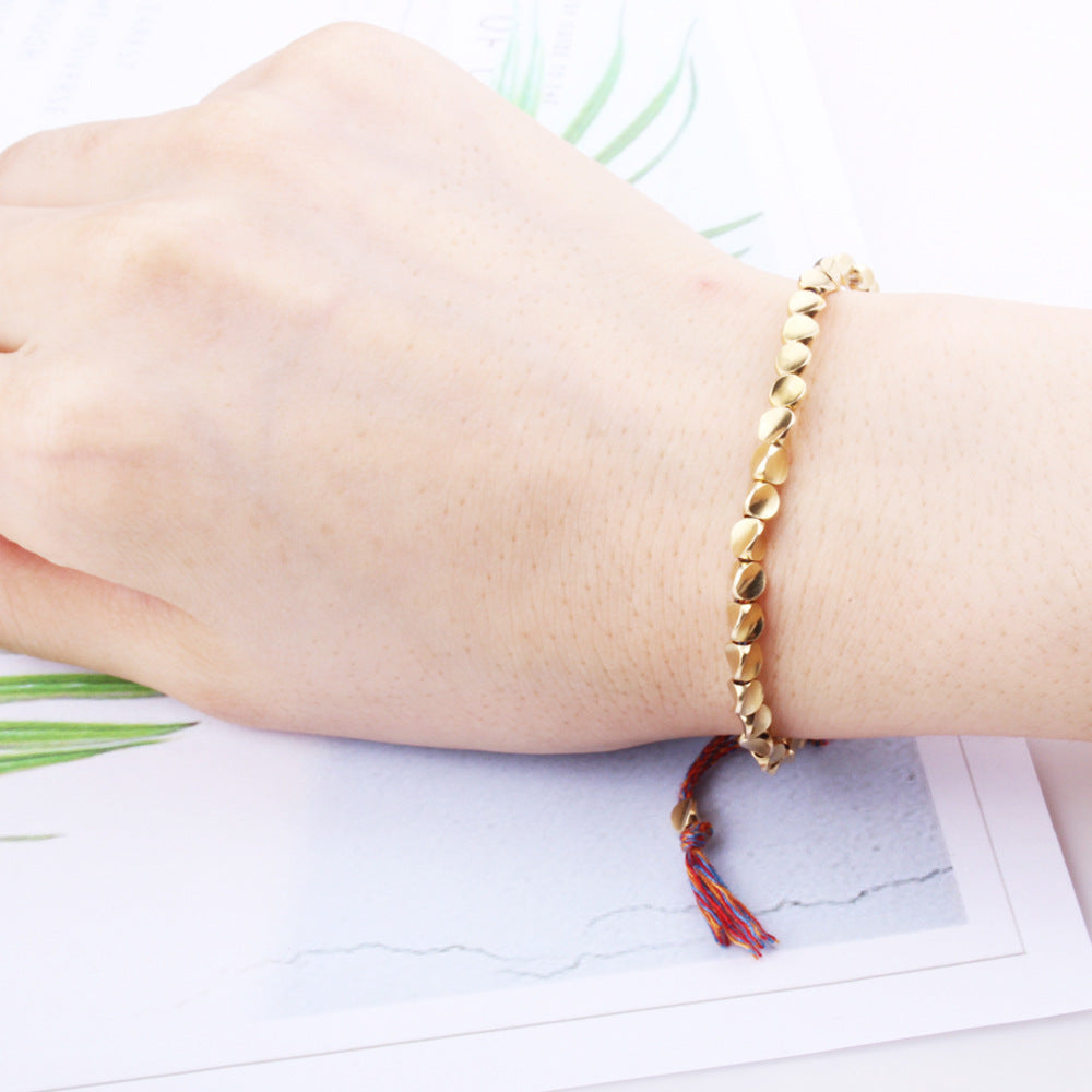 Hand Rope Winding Woven Bracelet Women's Fashion High-end Gift Can Be Pulled Special-shaped Copper Bead Fringed Woven Bracelet