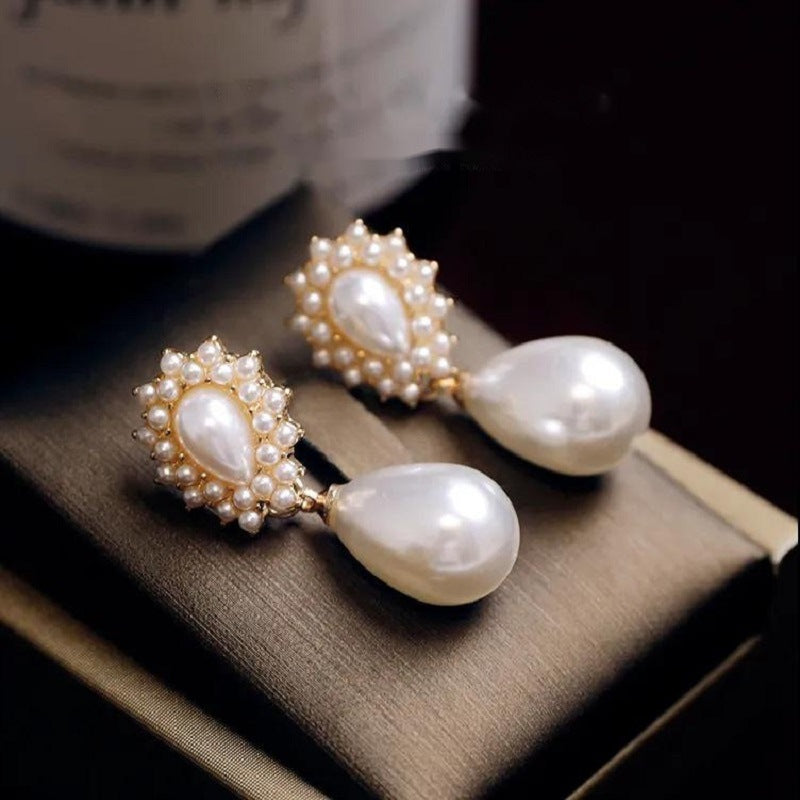 S925 Silver Needle Fashion Pearl Earrings Retro Hong Kong Style Design Simple Personality Oil Drip Earrings