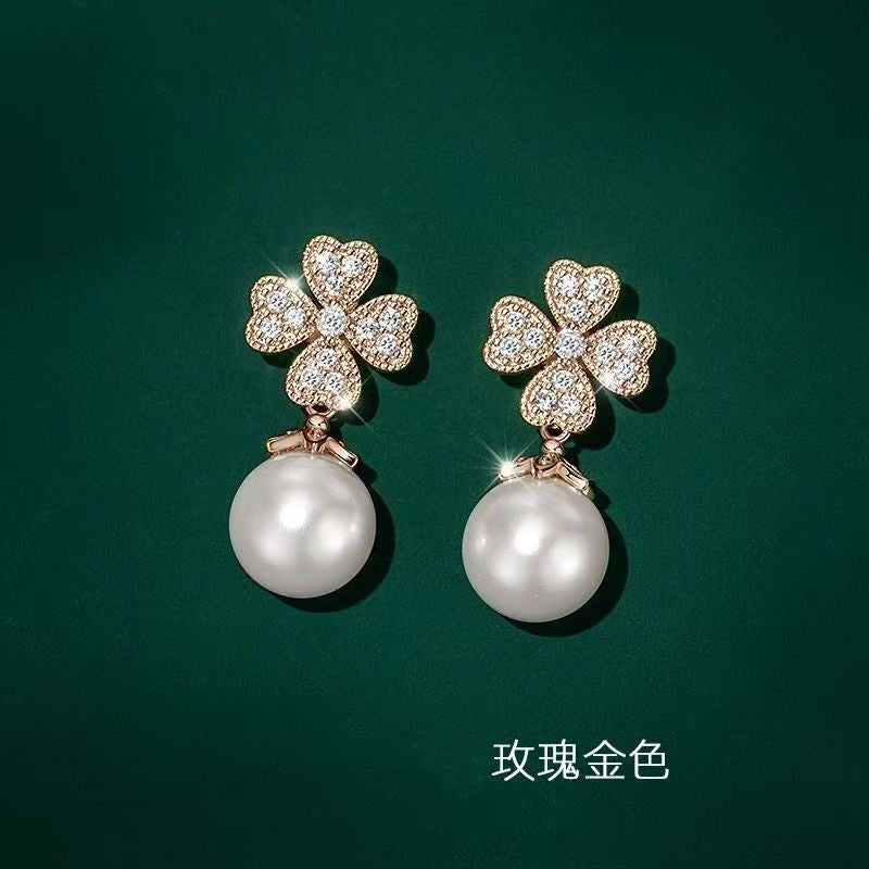 Four-leaf Clover Pearl Stud Earrings Ins Tide Earrings Temperament Advanced Sense Niche Explosion Gentle