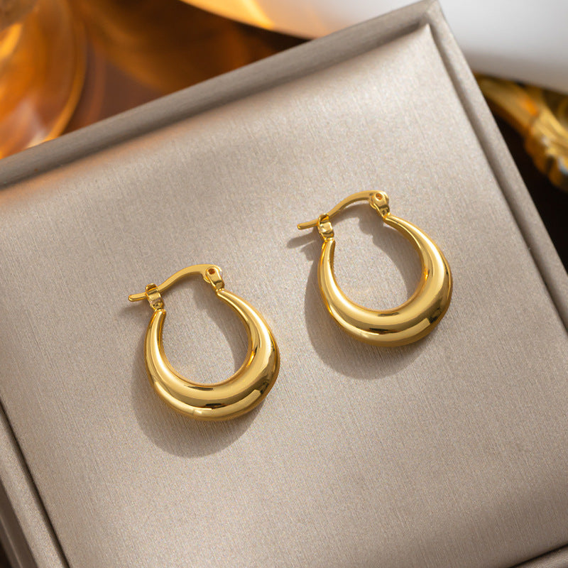Selling French retro European and American niche minimalist oval titanium steel, gold-plated fashion earrings for women