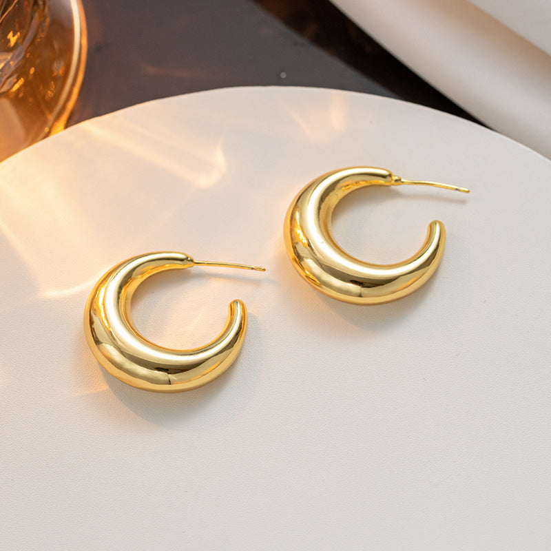 Simple retro smooth titanium steel circle earrings temperament light luxury high sense cold wind fashion foreign style stud earrings