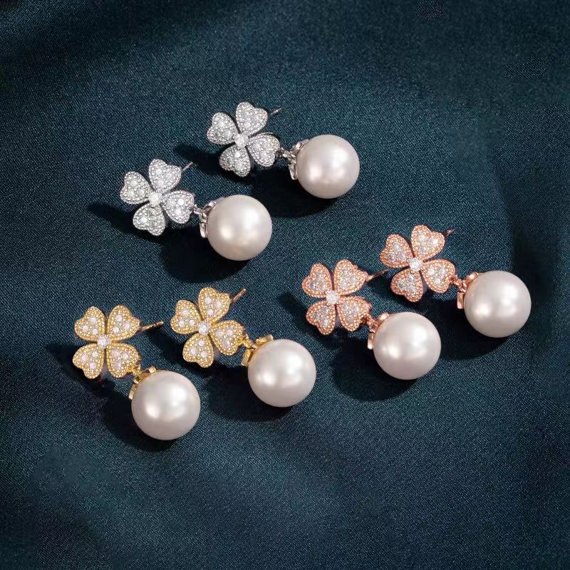 Four-leaf Clover Pearl Stud Earrings Ins Tide Earrings Temperament Advanced Sense Niche Explosion Gentle