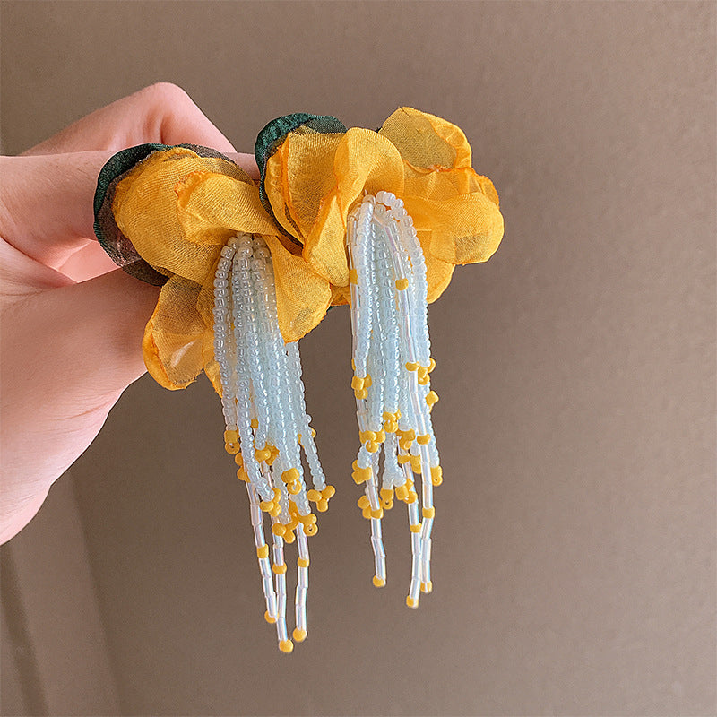 Super Fairy Temperament Mesh Yellow Flower Earrings Women's New Stud Earrings Seaside Vacation High-end Light Luxury Earrings