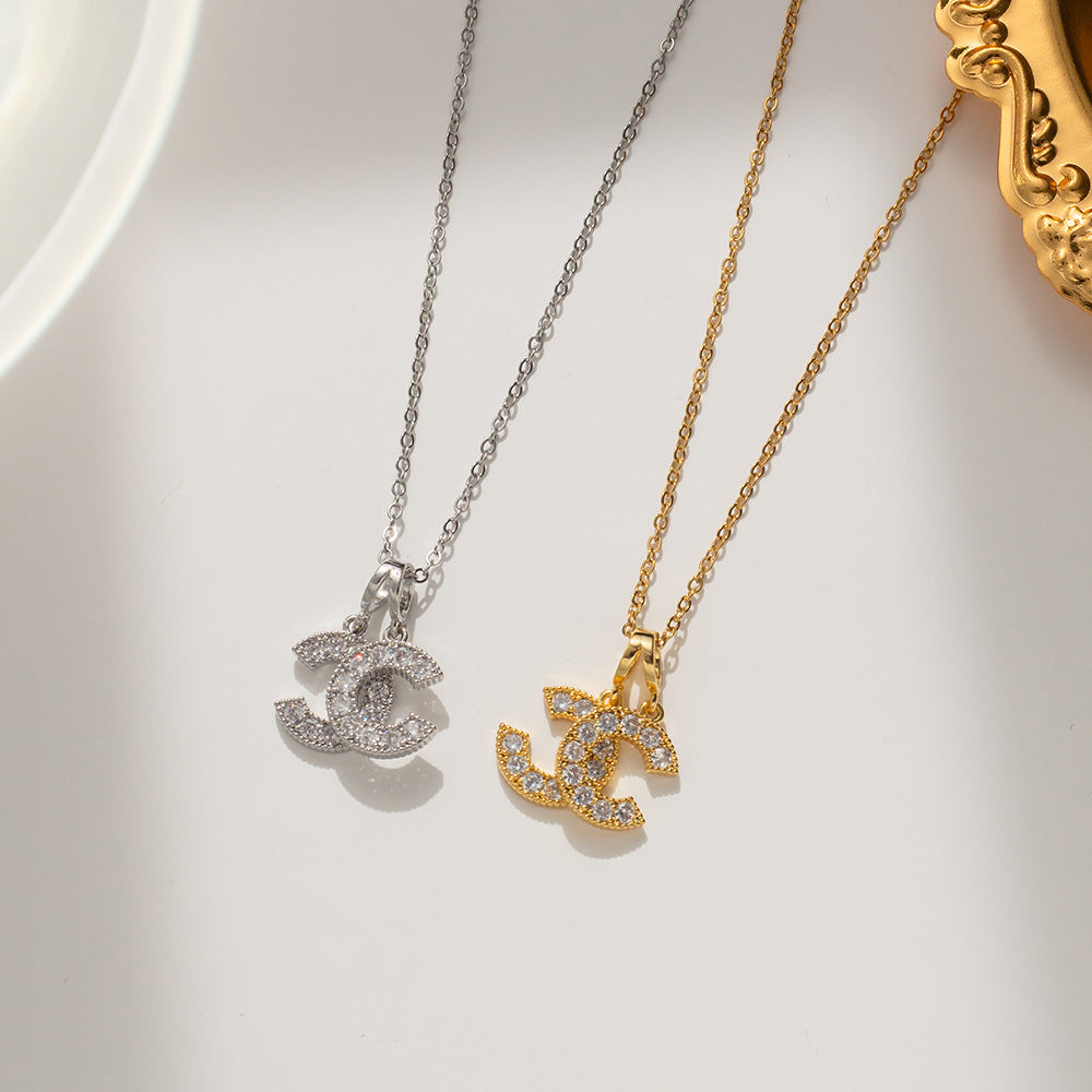 Korean Version of Titanium Steel Double C Necklace Women's Gold Micro-inlaid New Light Luxury Ins Fashion Versatile Model Supports One Piece of Hair