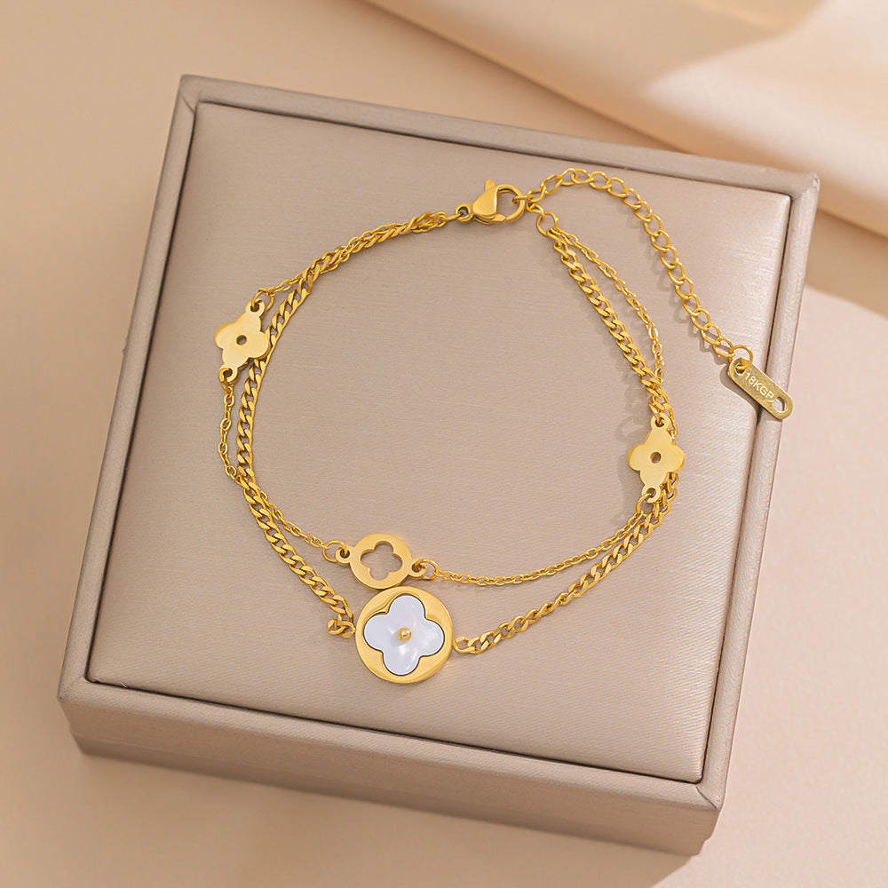 2025 New Titanium Steel Four-leaf Clover Bracelet Internet Celebrity Girlfriend White Fritillary Hollowed Out Hot Sale Factory Wholesale