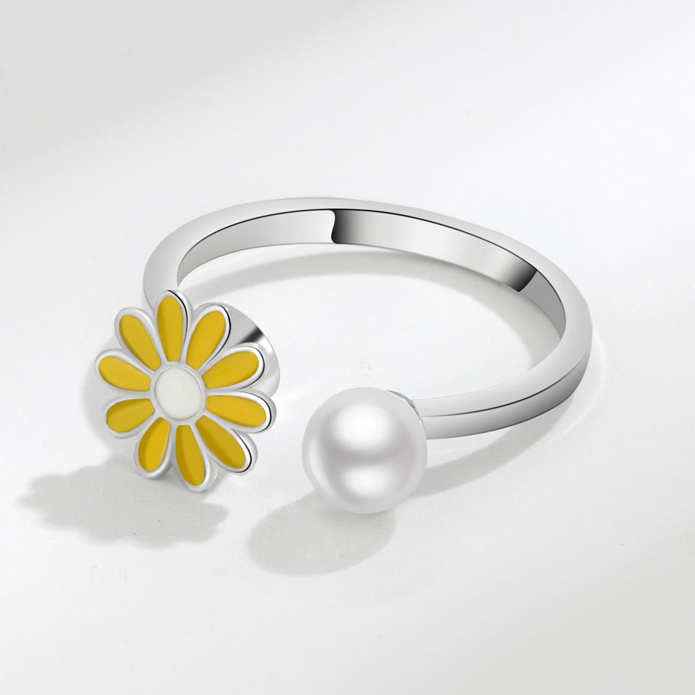 Popular Small Daisy Rotating Ring Female Design Sense Small Daisy Flower Pearl Ring Creative Dripping Jewelry Female