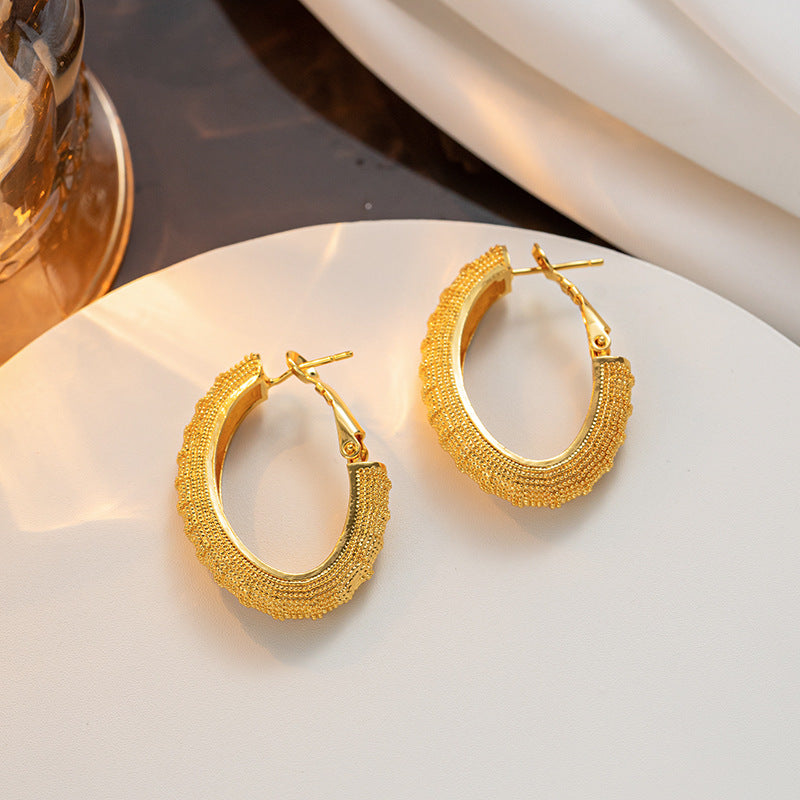 Hot-selling new product niche design copper-plated 18K gold hollow geometric earrings fashionable retro earrings women