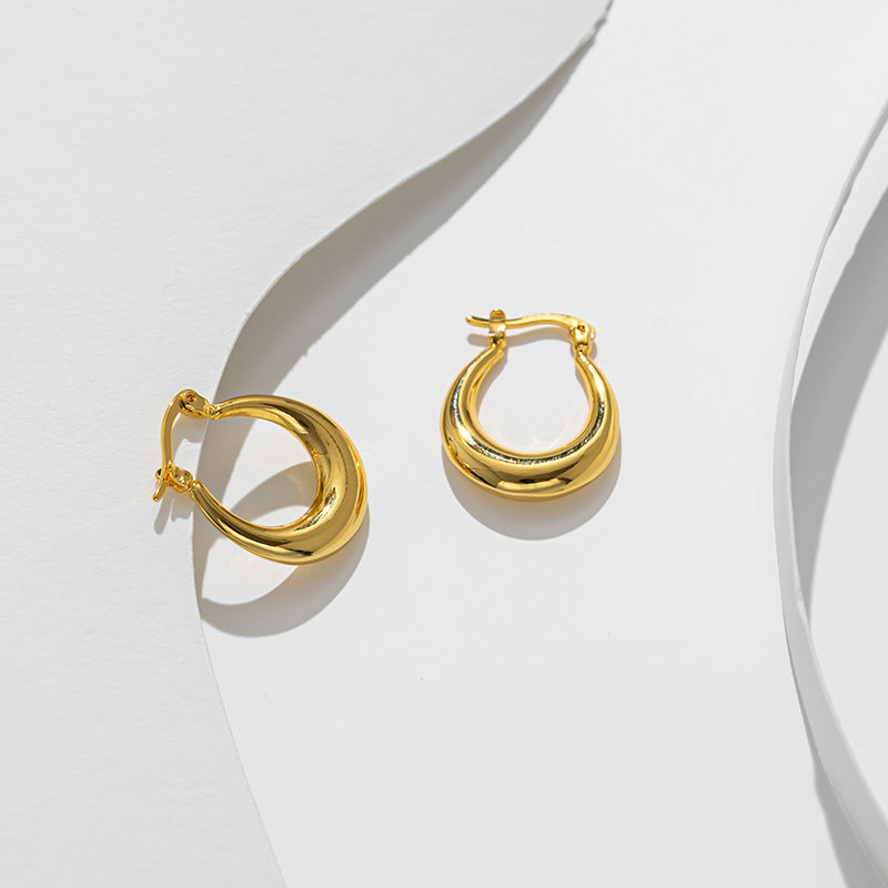 Selling French retro European and American niche minimalist oval titanium steel, gold-plated fashion earrings for women