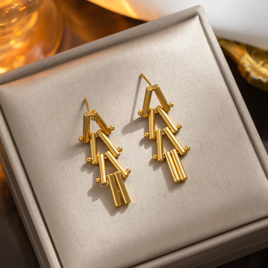 Titanium steel 18K real gold, fashionable triangular cylindrical splicing design creative long earrings, metallic 18K studs