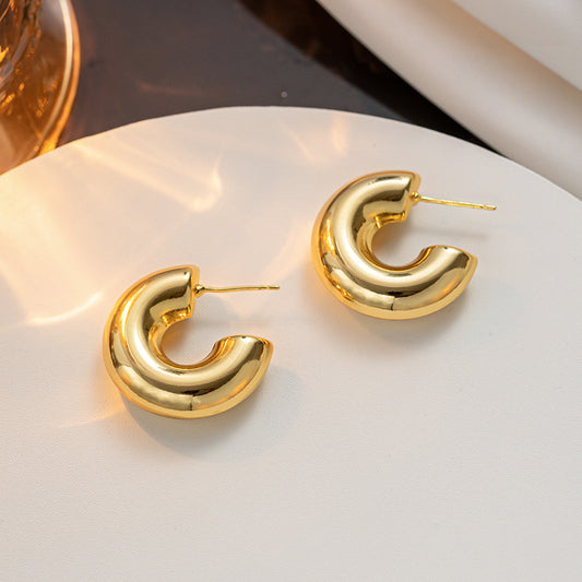 Europe and the United States hot selling thick cylindrical hollow earrings women, titanium steel plated 18K fashion commuter gold earrings jewelry